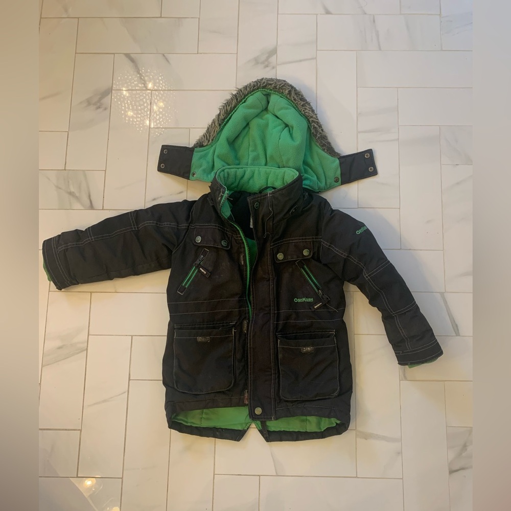 Good condition boys winter jacket. 3/4 length lined with hood size 5 very warm